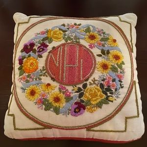 Vintage embroidered pillow with pansies, zinnias and roses